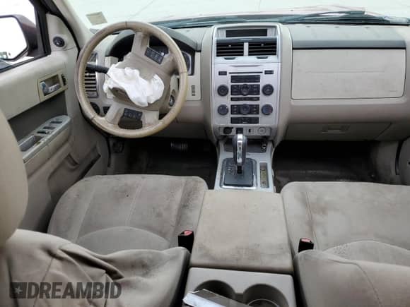 2011 Mercury Mariner z VIN 4M2CN8B77BKJ04820, wystawiony jako Copart lot #77322383 z przebiegiem Nie podano mil oraz Szkoda całkowita • Salvage title. Historia ofert i sprzedaży dostępna na DreamBid. Obrazek 8.