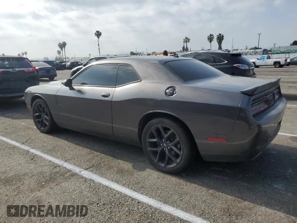 ✅ 2021 Dodge Challenger SXT • VIN: 2C3CDZAG6MH599882 • Lot: 49601674. Wystawiony na Copart z przebiegiem 61 214 mil. Bezpłatny archiwum sprzedaży aukcyjnych z USA i szczegółowy raport historii pojazdu na DreamBid. Zdjęcie 2.