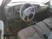 2004 Chevrolet Silverado 1500 Work Truck z VIN 1GCEK14V44Z262570, wystawiony jako Copart lot #76862394 z przebiegiem 138 432 mil mil oraz Szkoda całkowita • Salvage title. Historia ofert i sprzedaży dostępna na DreamBid. Obrazek 8.