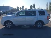 ✅ 2013 Honda Pilot Touring • VIN: 5FNYF4H94DB032372 • Lot: 43906615. Wystawiony na IAAI z przebiegiem 204 065 mil. Bezpłatny archiwum sprzedaży aukcyjnych z USA i szczegółowy raport historii pojazdu na DreamBid. Zdjęcie 14.