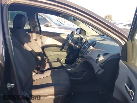 2013 Chevrolet Sonic LT with VIN 1G1JD6SB6D4227761, listed as a IAAI auction lot 42692104 with 162,600 mi miles and . Bid and sale history available at DreamBid. Image 5.