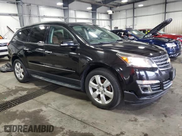 ✅ 2016 Chevrolet Traverse LTZ • VIN: 1GNKVJKD8GJ142463 • Lot: 69590905. Wystawiony na Copart z przebiegiem 127 007 mil. Bezpłatny archiwum sprzedaży aukcyjnych z USA i szczegółowy raport historii pojazdu na DreamBid. Zdjęcie 4.