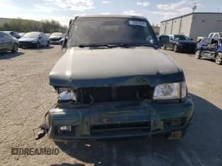 ✅ 1999 Isuzu Trooper S • VIN: JACDJ58X6X7912709 • Lot: 75357874. Listed on Copart with 138,332 mi. Free auction sales archive from the USA and detailed vehicle history report at DreamBid. Image 5.