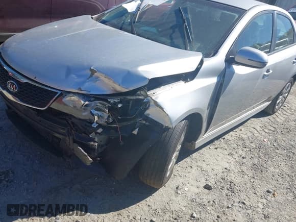 ✅ 2012 Kia Forte EX • VIN: KNAFU4A28C5633372 • Лот: 43343088. Опубликован ранее на IAAI с пробегом 148 756 миль. Бесплатный доступ к архиву аукционных продаж из США и подробный отчёт об истории автомобиля на DreamBid. Изображение 6.