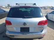 ✅ 2013 Volkswagen Touareg Sport • VIN: WVGEF9BP3DD003679 • Lot: 42973693. Listed on IAAI with 180,139 mi. Free auction sales archive from the USA and detailed vehicle history report at DreamBid. Image 16.