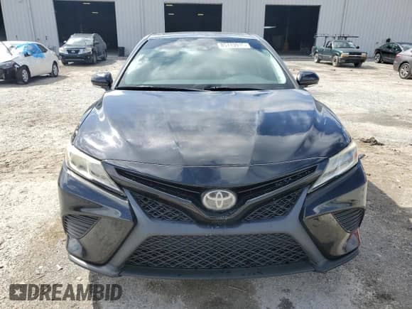 2019 Toyota Camry LE z VIN 4T1B11HK7KU772276, wystawiony jako Copart lot #85113915 z przebiegiem 85 306 mil mil oraz Szkoda całkowita • Salvage title. Historia ofert i sprzedaży dostępna na DreamBid. Obrazek 5.