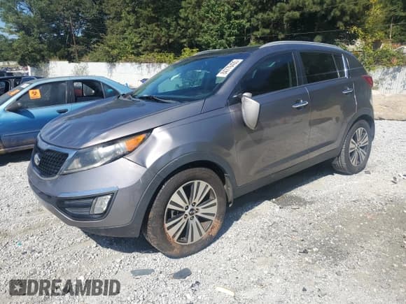 ✅ 2014 Kia Sportage EX • VIN: KNDPC3AC1E7634979 • Lot: 84776435. Listed on Copart with 127,778 mi. Free auction sales archive from the USA and detailed vehicle history report at DreamBid. Image 1.