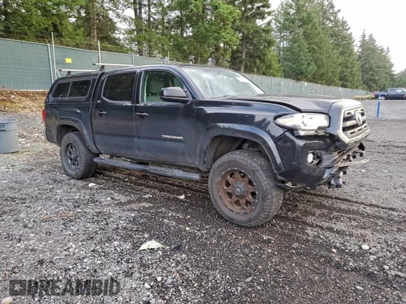 ✅ 2016 Toyota Tacoma TRD Off Road • VIN: 3TMCZ5AN1GM013969 • Lot: 94136925. Listed on Copart with 13,270 mi. Free auction sales archive from the USA and detailed vehicle history report at DreamBid. Image 4.