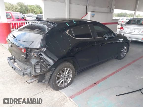 ✅ 2021 Mazda 3 S • VIN: JM1BPAJL5M1338061 • Lot: 40765593. Wystawiony na IAAI z przebiegiem 52 958 mil. Bezpłatny archiwum sprzedaży aukcyjnych z USA i szczegółowy raport historii pojazdu na DreamBid. Zdjęcie 4.