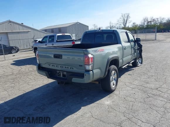 ✅ 2022 Toyota Tacoma TRD Off Road • VIN: 3TYDZ5BN1NT015418 • Lot: 43649466. Listed on IAAI with 58,704 mi. Free auction sales archive from the USA and detailed vehicle history report at DreamBid. Image 4.