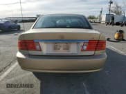 ✅ 2002 Kia Optima LX • VIN: KNAGD126X25156415 • Lot: 80253444. Listed on Copart with 104,775 mi. Free auction sales archive from the USA and detailed vehicle history report at DreamBid. Image 6.