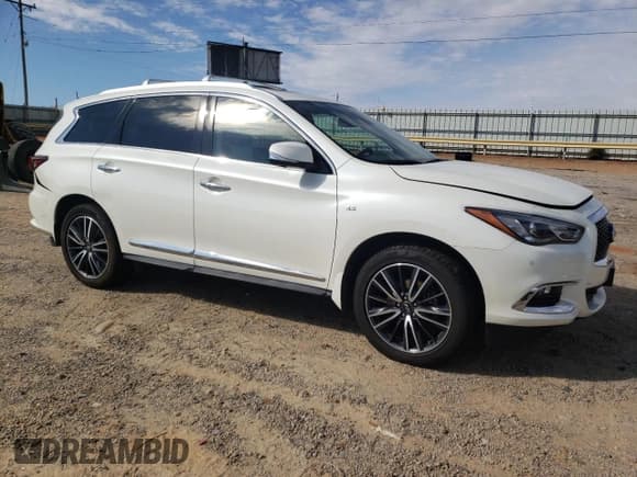 ✅ 2020 Infiniti QX60 Signature Edition • VIN: 5N1DL0MM3LC547719 • Lot: 75979604. Listed on Copart with 134,982 mi. Free auction sales archive from the USA and detailed vehicle history report at DreamBid. Image 4.