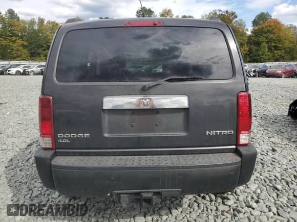 2011 Dodge Nitro Shock z VIN 1D4PU7GX1BW587469, wystawiony jako Copart lot #75915524 z przebiegiem 157 814 mil mil oraz Szkoda całkowita • Salvage title. Historia ofert i sprzedaży dostępna na DreamBid. Obrazek 6.