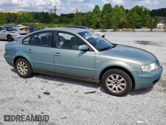 ✅ 1999 Volkswagen Passat • VIN: WVWMA63B2XE520356 • Lot: 59873155. Listed on Copart with 207,187 mi. Free auction sales archive from the USA and detailed vehicle history report at DreamBid. Image 4.