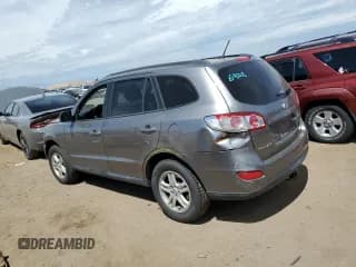 ✅ 2012 Hyundai Santa Fe GLS • VIN: 5XYZGDAB5CG130803 • Lot: 68308744. Listed on Copart with 123,729 mi. Free auction sales archive from the USA and detailed vehicle history report at DreamBid. Image 2.