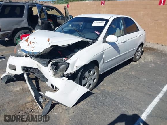 ✅ 2009 Kia Spectra EX • VIN: KNAFE222595646721 • Lot: 43634369. Wystawiony na IAAI z przebiegiem 101 604 mil. Bezpłatny archiwum sprzedaży aukcyjnych z USA i szczegółowy raport historii pojazdu na DreamBid. Zdjęcie 2.