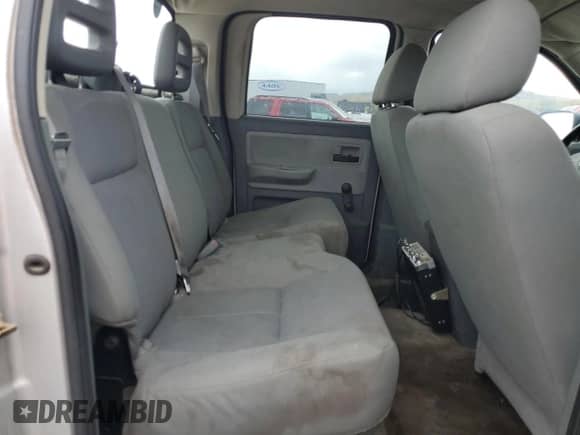 2006 Dodge Dakota ST z VIN 1D7HE28K76S641283, wystawiony jako Copart lot #78939474 z przebiegiem 229 561 mil mil oraz Szkoda całkowita • Salvage title. Historia ofert i sprzedaży dostępna na DreamBid. Obrazek 10.