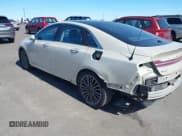 ✅ 2014 Lincoln MKZ • VIN: 3LN6L2G9XER820400 • Lot: 42195277. Wystawiony na IAAI z przebiegiem 48 597 mil. Bezpłatny archiwum sprzedaży aukcyjnych z USA i szczegółowy raport historii pojazdu na DreamBid. Zdjęcie 3.