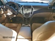 ✅ 2012 Cadillac SRX Luxury Collection • VIN: 3GYFNAE39CS571885 • Lot: 95023075. Wystawiony na Copart z przebiegiem 20 760 mil. Bezpłatny archiwum sprzedaży aukcyjnych z USA i szczegółowy raport historii pojazdu na DreamBid. Zdjęcie 8.