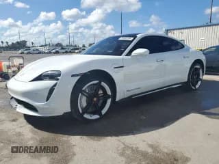 ✅ 2021 Porsche Taycan Turbo • VIN: WP0AC2Y14MSA63376 • Lot: 76980294. Listed on Copart with 31,621 mi. Free auction sales archive from the USA and detailed vehicle history report at DreamBid. Image 1.