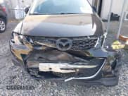 ✅ 2010 Mazda CX-9 Grand Touring • VIN: JM3TB3MV4A0205814 • Lot: 39699888. Wystawiony na IAAI z przebiegiem 201 296 mil. Bezpłatny archiwum sprzedaży aukcyjnych z USA i szczegółowy raport historii pojazdu na DreamBid. Zdjęcie 6.