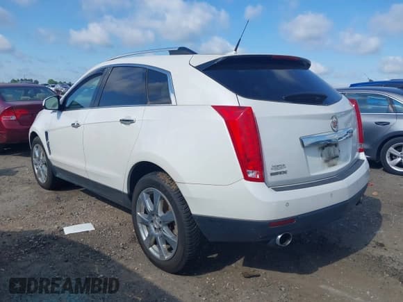 ✅ 2011 Cadillac SRX Performance Collection • VIN: 3GYFNBEY0BS546857 • Лот: 42435449. Опубликован ранее на IAAI с пробегом 183 445 миль. Бесплатный доступ к архиву аукционных продаж из США и подробный отчёт об истории автомобиля на DreamBid. Изображение 3.