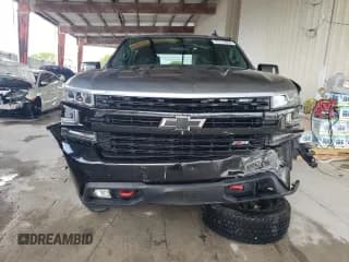 ✅ 2021 Chevrolet Silverado 1500 LT Trail Boss • VIN: 3GCPYFED2MG258883 • Lot: 57219844. Wystawiony na Copart z przebiegiem 81 605 mil. Bezpłatny archiwum sprzedaży aukcyjnych z USA i szczegółowy raport historii pojazdu na DreamBid. Zdjęcie 5.