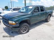 ✅ 2000 Dodge Dakota Sport • VIN: 1B7GG2AN4YS641376 • Lot: 42867876. Wystawiony na IAAI z przebiegiem 282 598 mil. Bezpłatny archiwum sprzedaży aukcyjnych z USA i szczegółowy raport historii pojazdu na DreamBid. Zdjęcie 2.