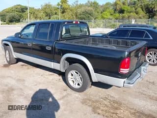 ✅ 2002 Dodge Dakota SLT • VIN: 1B7HL48X82S603451 • Lot: 43524640. Wystawiony na IAAI z przebiegiem 176 199 mil. Bezpłatny archiwum sprzedaży aukcyjnych z USA i szczegółowy raport historii pojazdu na DreamBid. Zdjęcie 3.