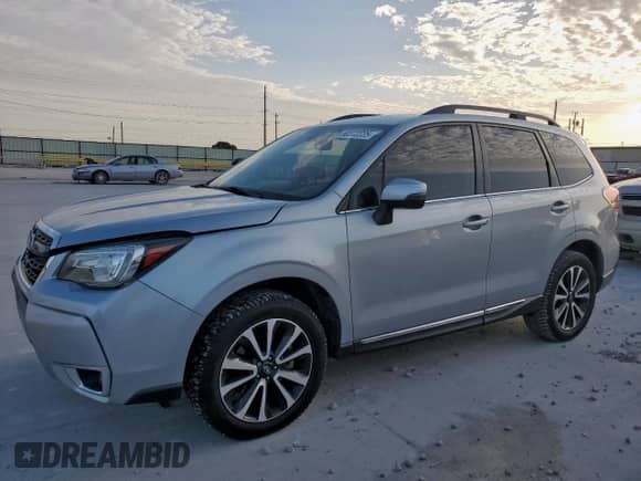 2017 Subaru Forester Touring z VIN JF2SJGWC4HH811430, wystawiony jako Copart lot #60372225 z przebiegiem 61 481 mil mil oraz Czysty tytuł • Clean title. Historia ofert i sprzedaży dostępna na DreamBid. Obrazek 1.