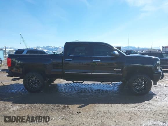 ✅ 2015 Chevrolet Silverado 1500 High Country • VIN: 3GCUKTEJ6FG272653 • Лот: 41820225. Опубликован ранее на IAAI с пробегом 130 953 миль. Бесплатный доступ к архиву аукционных продаж из США и подробный отчёт об истории автомобиля на DreamBid. Изображение 13.