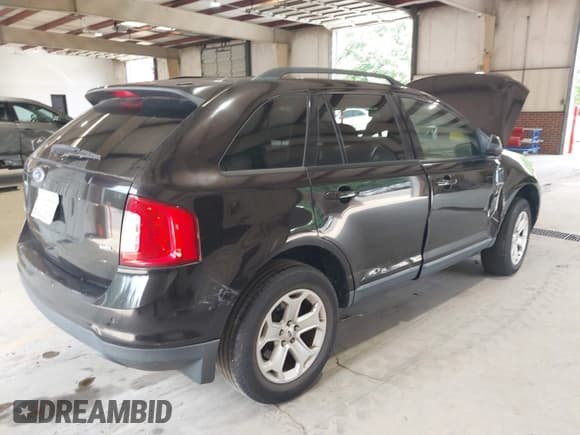 ✅ 2013 Ford Edge SEL • VIN: 2FMDK3JC4DBA97046 • Лот: 42578532. Опубликован ранее на IAAI с пробегом 198 228 миль. Бесплатный доступ к архиву аукционных продаж из США и подробный отчёт об истории автомобиля на DreamBid. Изображение 4.