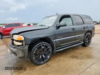 ✅ 2003 GMC Yukon Denali • VIN: 1GKEK63U73J331629 • Lot: 82126865. Listed on Copart with 219,916 mi. Free auction sales archive from the USA and detailed vehicle history report at DreamBid. Image 1.