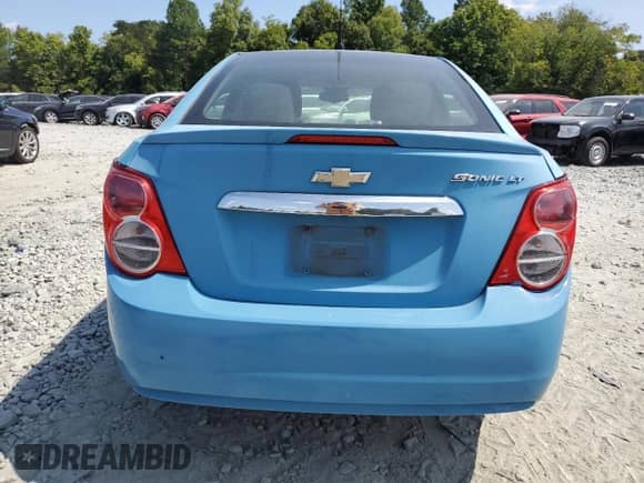 2014 Chevrolet Sonic LT с VIN 1G1JC5SH2E4163947, выставлен на аукционе Copart как лот 64984734 с пробегом Не указан миль и Списание • Salvage title. История ставок и продаж доступна на DreamBid. Изображение 6.