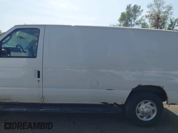 ✅ 2012 Ford Econoline Cargo Recreational • VIN: 1FTNE2EW2CDB00498 • Lot: 42942224. Wystawiony na IAAI z przebiegiem 193 272 mil. Bezpłatny archiwum sprzedaży aukcyjnych z USA i szczegółowy raport historii pojazdu na DreamBid. Zdjęcie 14.