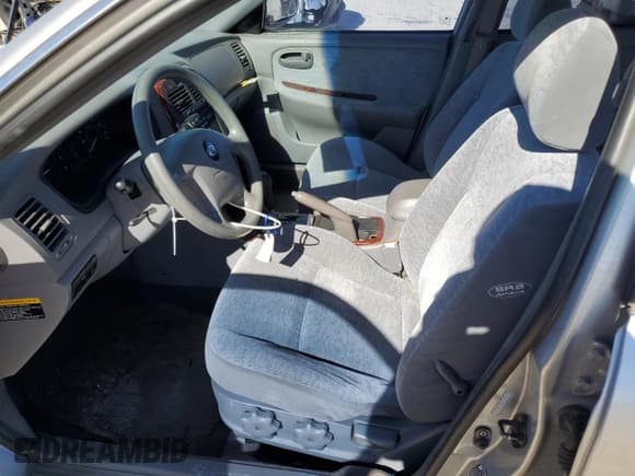 ✅ 2006 Kia Optima LX • VIN: KNAGD128565443202 • Лот: 86079074. Опубликован ранее на Copart с пробегом 77 684 миль. Бесплатный доступ к архиву аукционных продаж из США и подробный отчёт об истории автомобиля на DreamBid. Изображение 7.