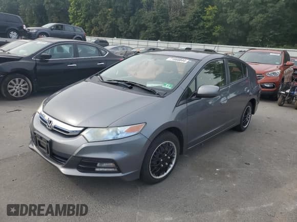✅ 2013 Honda Insight • VIN: JHMZE2H31DS003274 • Лот: 71668844. Опубликован ранее на Copart с пробегом 169 131 миль. Бесплатный доступ к архиву аукционных продаж из США и подробный отчёт об истории автомобиля на DreamBid. Изображение 1.