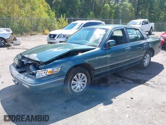 ✅ 1995 Mercury Grand Marquis GS • VIN: 2MELM74W7SX620663 • Лот: 43277267. Опубликован ранее на IAAI с пробегом 128 621 миль. Бесплатный доступ к архиву аукционных продаж из США и подробный отчёт об истории автомобиля на DreamBid. Изображение 20.