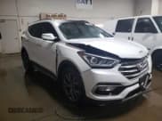 ✅ 2017 Hyundai Santa Fe Ultimate • VIN: 5XYZWDLA9HG497332 • Лот: 81956703. Опубликован ранее на Copart с пробегом 64 637 миль. Бесплатный доступ к архиву аукционных продаж из США и подробный отчёт об истории автомобиля на DreamBid. Изображение 4.