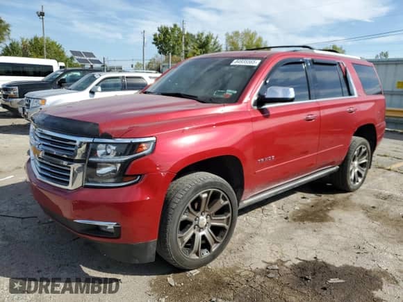 2015 Chevrolet Tahoe LTZ с VIN 1GNSKCKC4FR277564, выставлен на аукционе Copart как лот 84935565 с пробегом 150 512 миль миль и Чистый • Clean title. История ставок и продаж доступна на DreamBid. Изображение 1.
