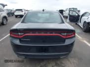 ✅ 2023 Dodge Charger SXT • VIN: 2C3CDXBG5PH579520 • Lot: 43245472. Listed on IAAI with 59,873 mi. Free auction sales archive from the USA and detailed vehicle history report at DreamBid. Image 16.