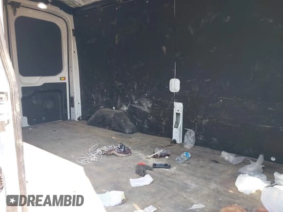 ✅ 2025 Ford Transit Cargo • VIN: 1FTBR1C8XSKA04313 • Lot: 43166073. Listed on IAAI with 13,152 mi. Free auction sales archive from the USA and detailed vehicle history report at DreamBid. Image 8.