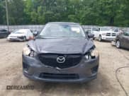 ✅ 2014 Mazda CX-5 Sport • VIN: JM3KE2BE5E0350057 • Lot: 42145910. Listed on IAAI with 157,517 mi. Free auction sales archive from the USA and detailed vehicle history report at DreamBid. Image 12.