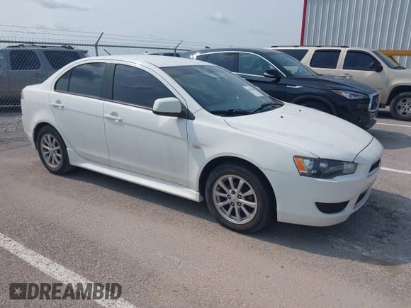✅ 2012 Mitsubishi Lancer SE • VIN: JA32V2FW0CU020567 • Lot: 42392482. Listed on IAAI with 197,348 mi. Free auction sales archive from the USA and detailed vehicle history report at DreamBid. Image 1.