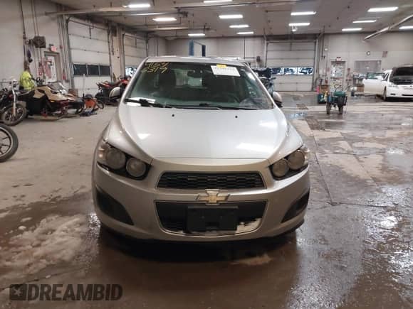 2013 Chevrolet Sonic LT with VIN 1G1JD6SH7D4203621, listed as a IAAI auction lot 41546319 with 201,164 mi miles and . Bid and sale history available at DreamBid. Image 13.