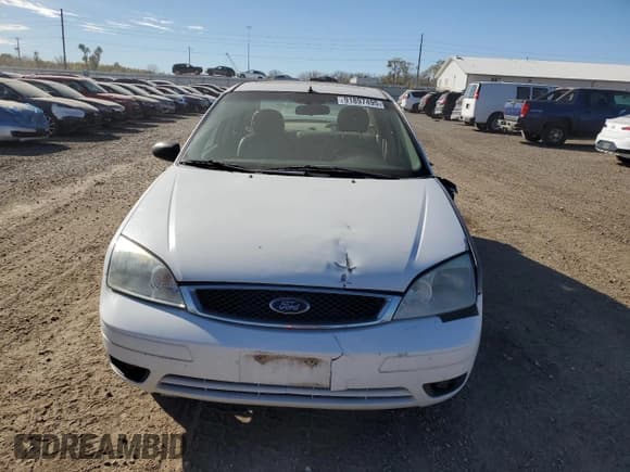 ✅ 2006 Ford Focus S • VIN: 1FAHP34N06W171378 • Lot: 91897495. Wystawiony na Copart z przebiegiem 179 059 mil. Bezpłatny archiwum sprzedaży aukcyjnych z USA i szczegółowy raport historii pojazdu na DreamBid. Zdjęcie 5.