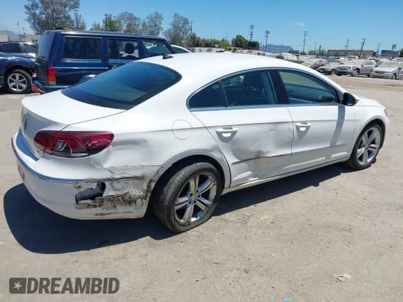 ✅ 2013 Volkswagen CC R-Line • VIN: WVWBP7AN0DE510087 • Lot: 42690806. Listed on IAAI with 125,738 mi. Free auction sales archive from the USA and detailed vehicle history report at DreamBid. Image 4.