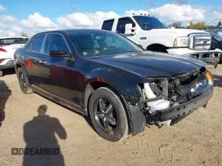 ✅ 2014 Chrysler 300 • VIN: 2C3CCAAG4EH220965 • Лот: 43565938. Опубликован ранее на IAAI с пробегом 123 394 миль. Бесплатный доступ к архиву аукционных продаж из США и подробный отчёт об истории автомобиля на DreamBid. Изображение 1.