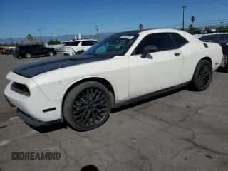 2013 Dodge Challenger SXT z VIN 2C3CDYAG5DH649553, wystawiony jako Copart lot #90937935 z przebiegiem 141 237 mil mil oraz Czysty tytuł • Clean title. Historia ofert i sprzedaży dostępna na DreamBid. Obrazek 1.