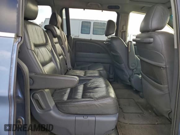 ✅ 2006 Honda Odyssey EX-L • VIN: 5FNRL38776B070297 • Лот: 95570655. Опубликован ранее на Copart с пробегом 124 763 миль. Бесплатный доступ к архиву аукционных продаж из США и подробный отчёт об истории автомобиля на DreamBid. Изображение 11.